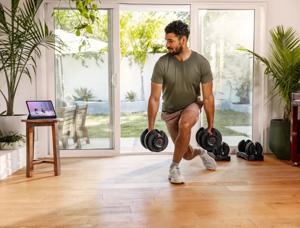 man lifting weights